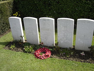 Wilfred Owen's grave - Attribution: Hector, Creative Commons licence
